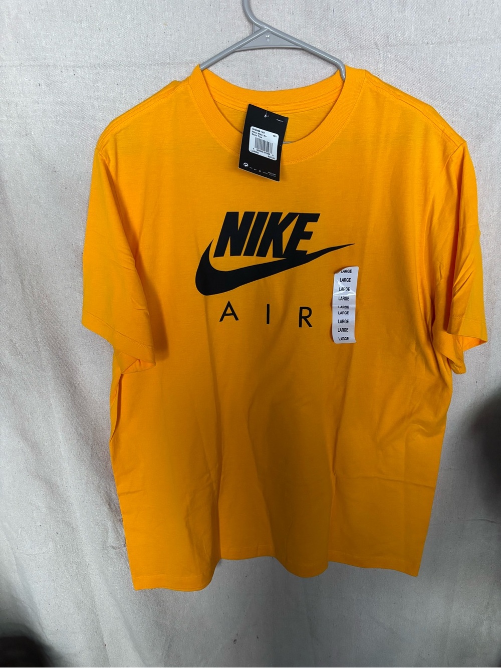 Nike Air Short-Sleeve Tee in Vibrant Yellow with Black Logo
